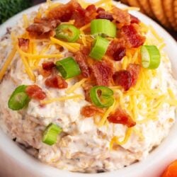 Bacon ranch dip in a white bowl.