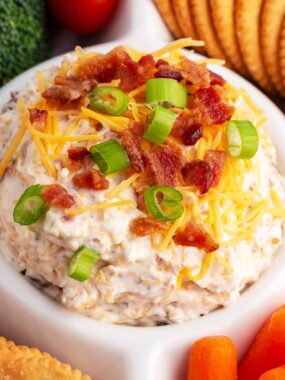Bacon ranch dip in a white bowl.