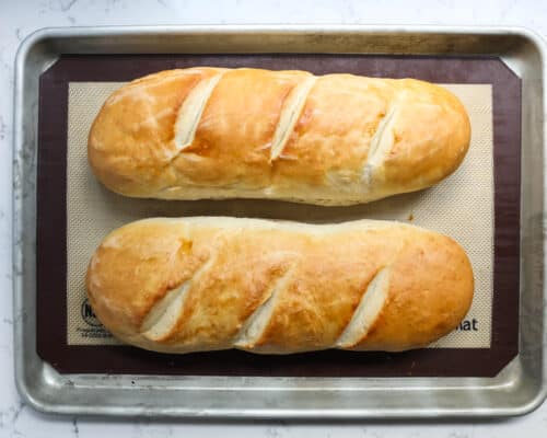 French bread loaves on pan