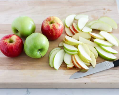 sliced apples on cutting board