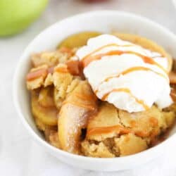 apple cobbler with ice cream and caramel sauce