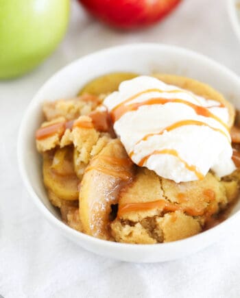 apple cobbler with ice cream and caramel sauce