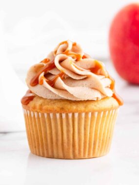 apple pie cupcake with caramel sauce on top