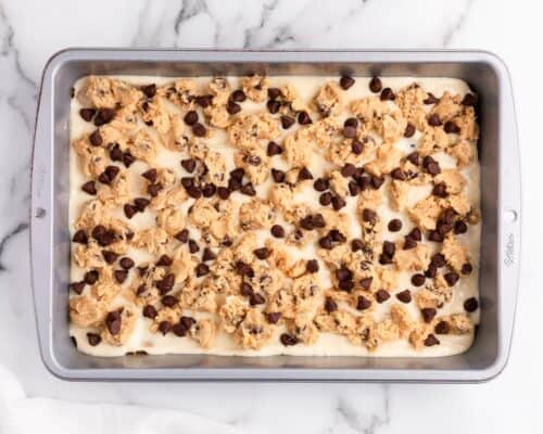 chocolate chip cookie dough sprinkled in pan