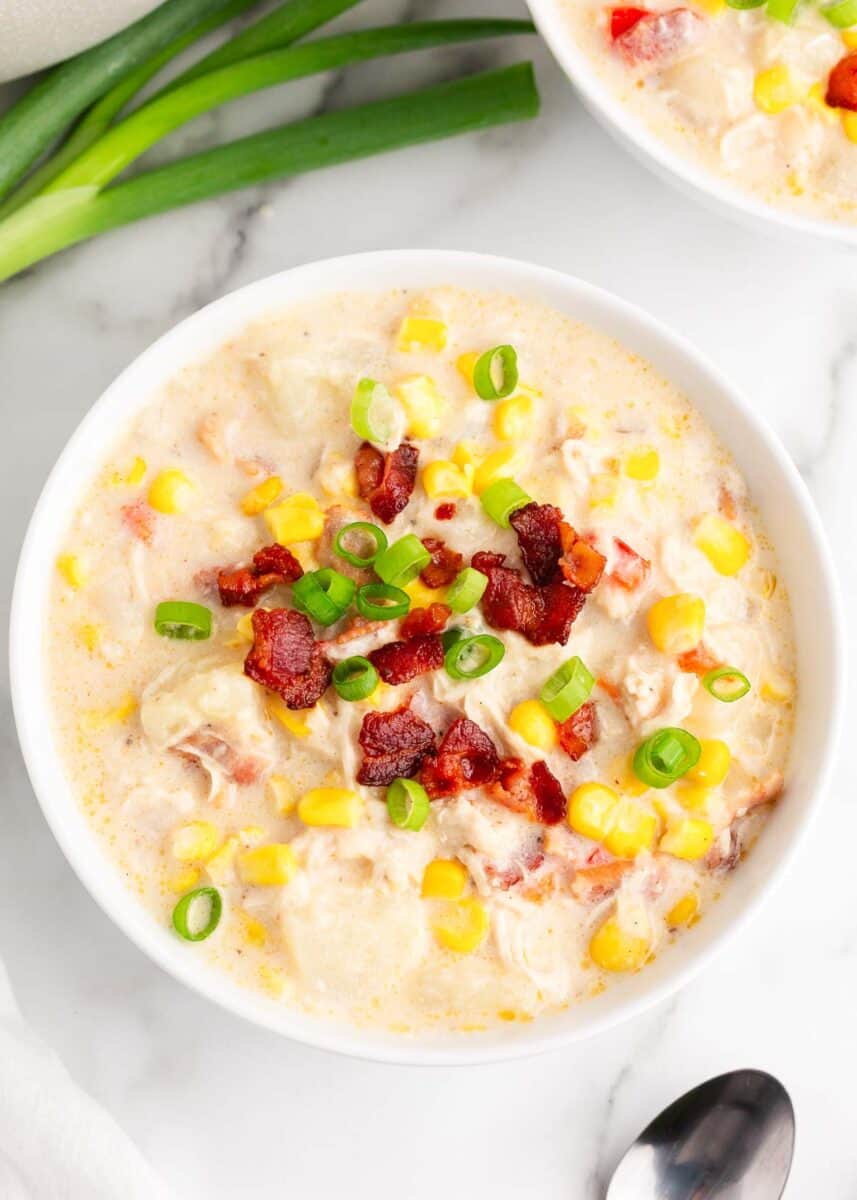 chicken and corn chowder in white bowl