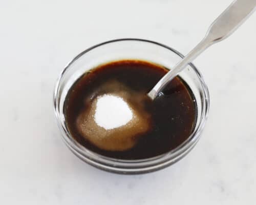 mixing soy sauce and sugar in bowl