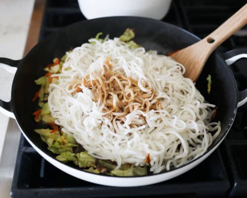 cooking rice noodles in skillet