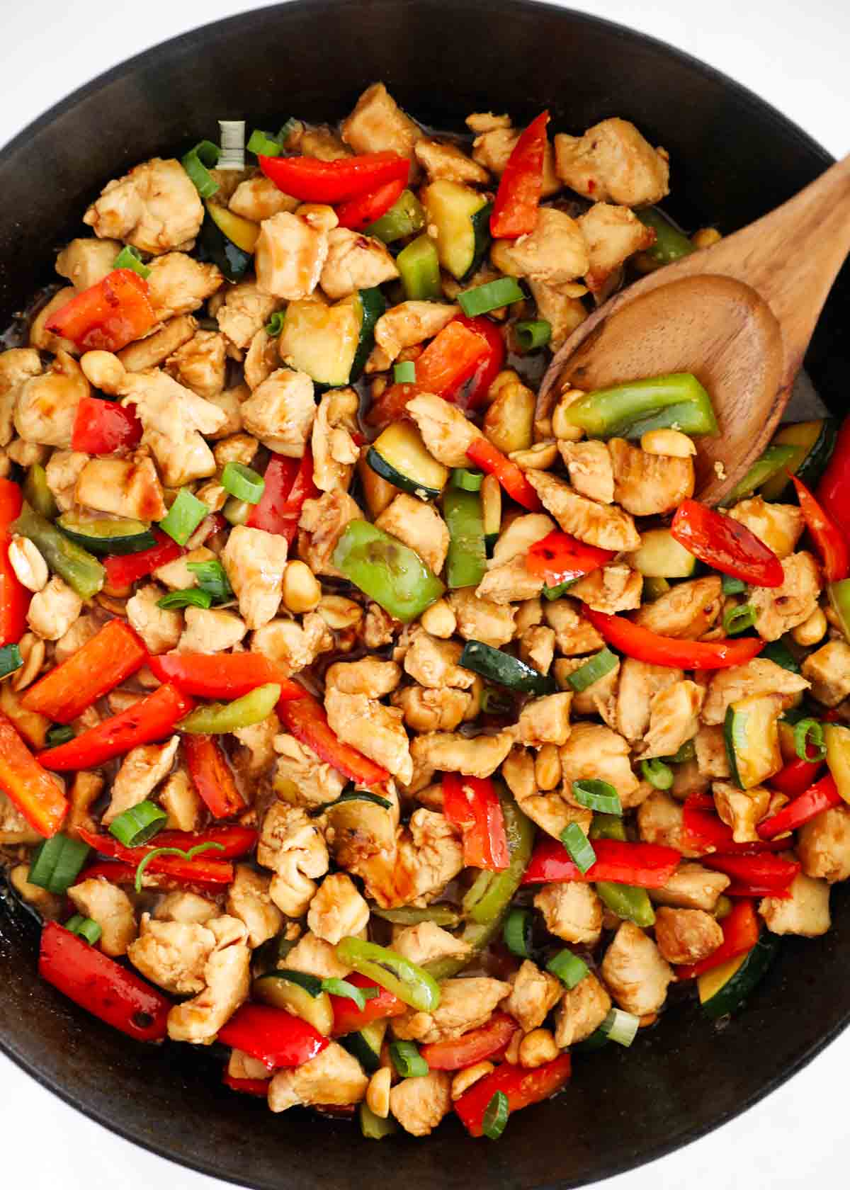 Kung pao chicken in skillet.