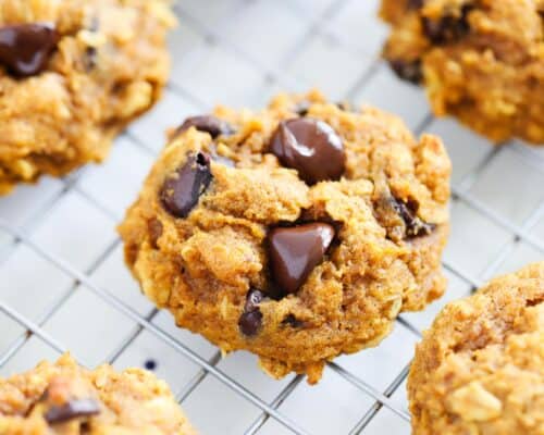 pumpkin oatmeal chocolate chip cookie on cooling rack
