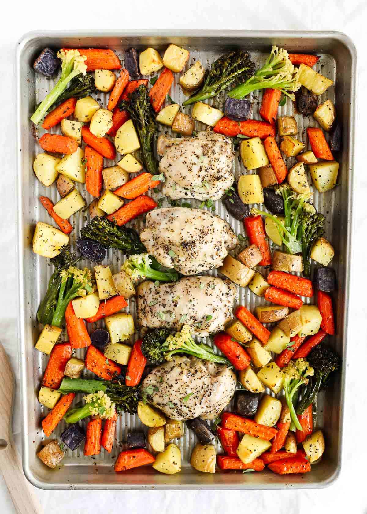 Chicken and vegetables on sheet pan.