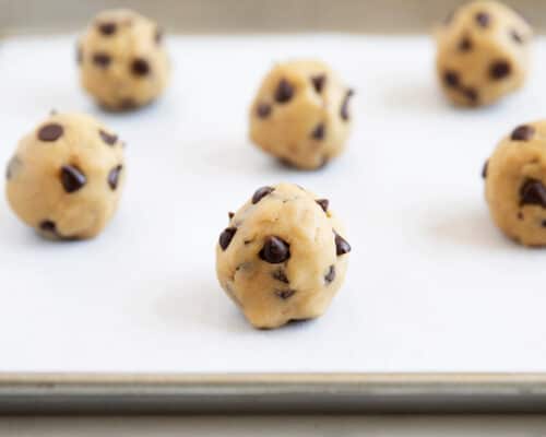 chocolate chip cookie dough balls on pan