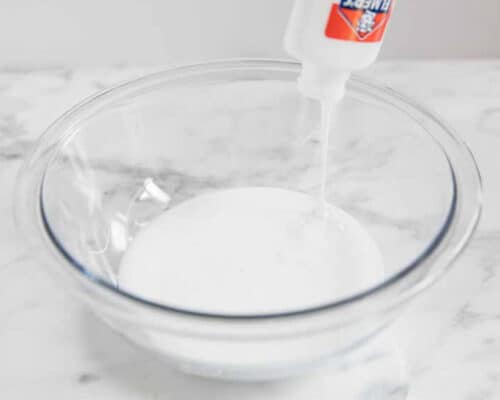pouring glue into bowl