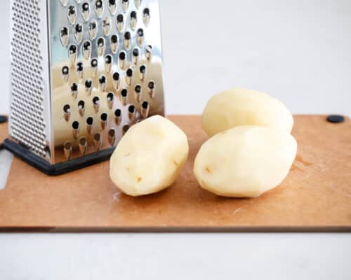 potatoes on cutting board
