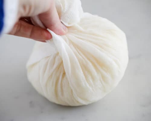 squeezing water out in paper towel