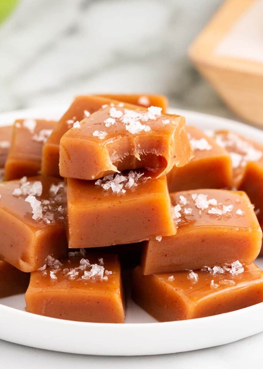 stacked caramels on white plate