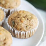 banana zucchini muffins on white plate