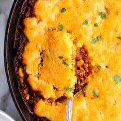 spoonful of chili cornbread skillet