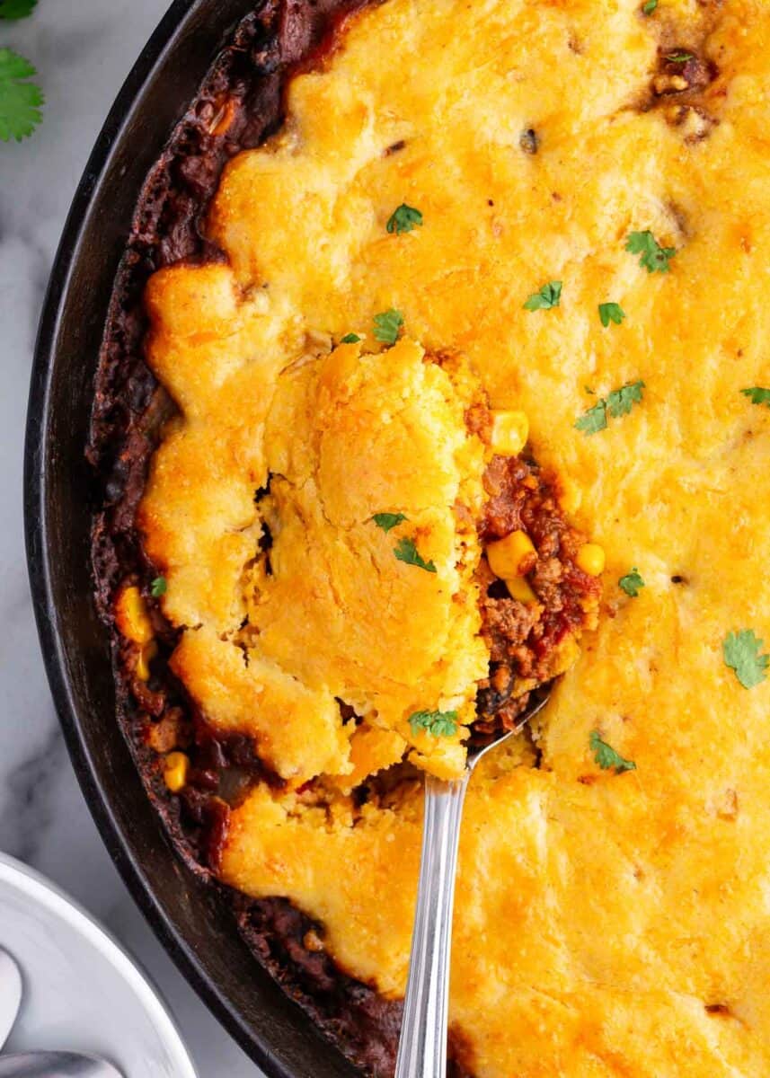 spoonful of chili cornbread skillet