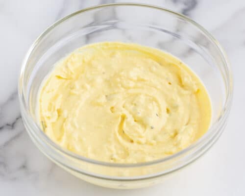 deviled egg ingredients in glass bowl