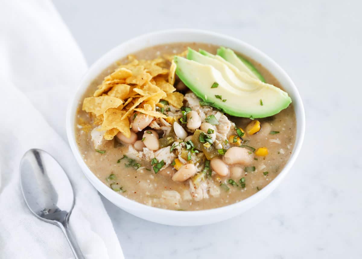 green enchilada chicken soup in bowl