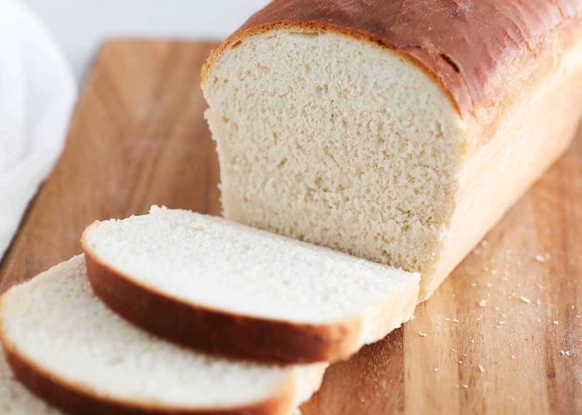 sliced bread loaf on cutting board