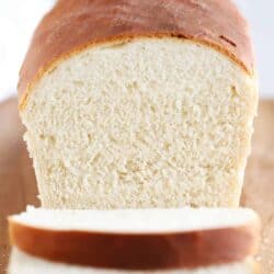 sliced bread loaf on cutting board