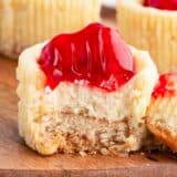 Bite taken from mini cheesecake with vanilla wafers