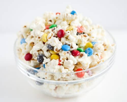 m&m popcorn in glass bowl