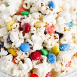 white chocolate m&m popcorn in bowl