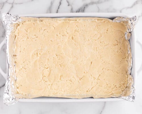 shortbread crumbs pressed into baking dish