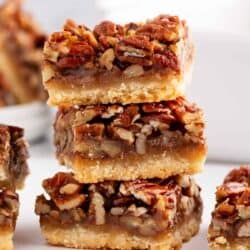 stacked pecan bars on counter