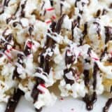 Close up of peppermint popcorn on parchment paper