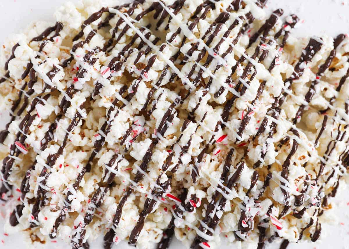 Peppermint popcorn on parchment paper.