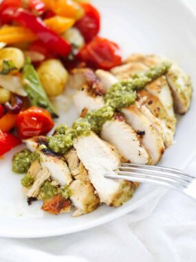 sliced pesto chicken on plate
