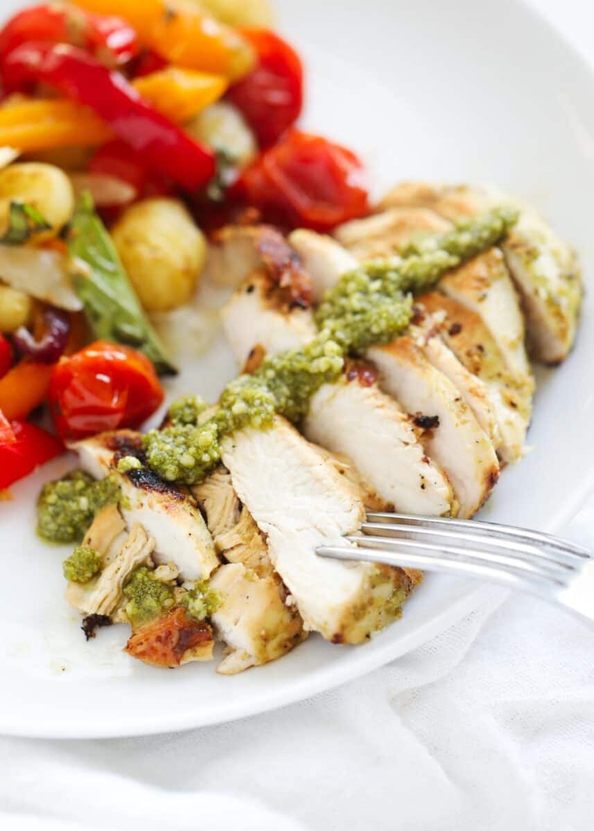 sliced pesto chicken on plate