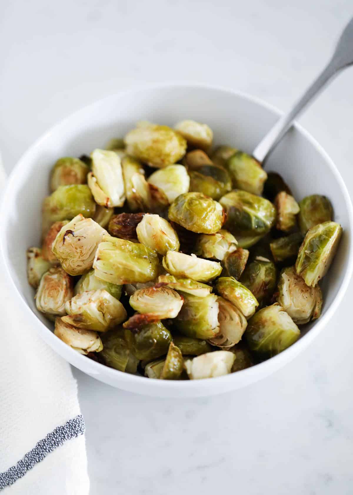 roasted brussel sprouts in white bowl