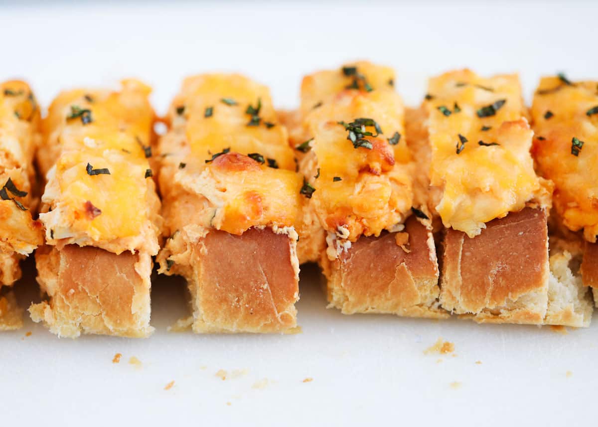 sliced stuffed french bread with cheese