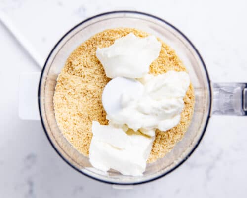sugar cookie crumbs and cream cheese in food processor