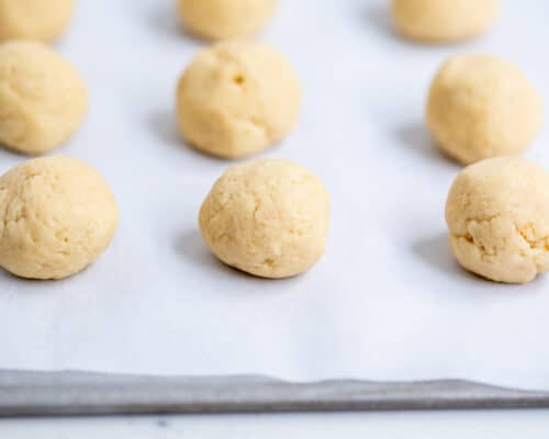 sugar cookie balls on pan