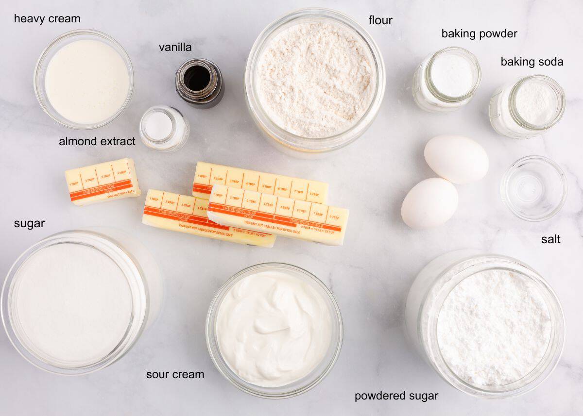 Ingredients for Halloween sugar cookies and buttercream frosting arranged on a counter.