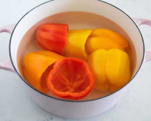 bell peppers in pot of water