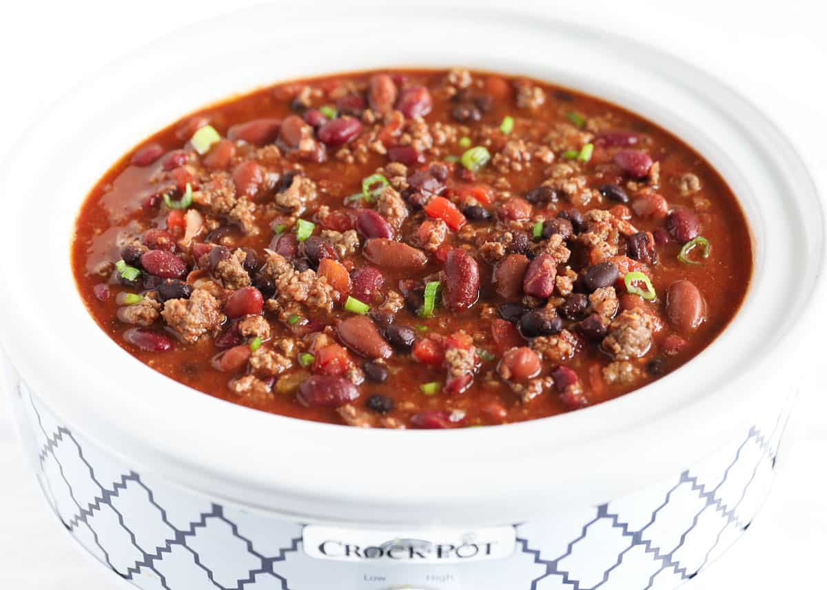 This crockpot chili is a healthy, wholesome, and flavor-loaded recipe that's cooked nice and slow so the flavors meld so that each spoonful is better than the one before! chili in white crockpot
