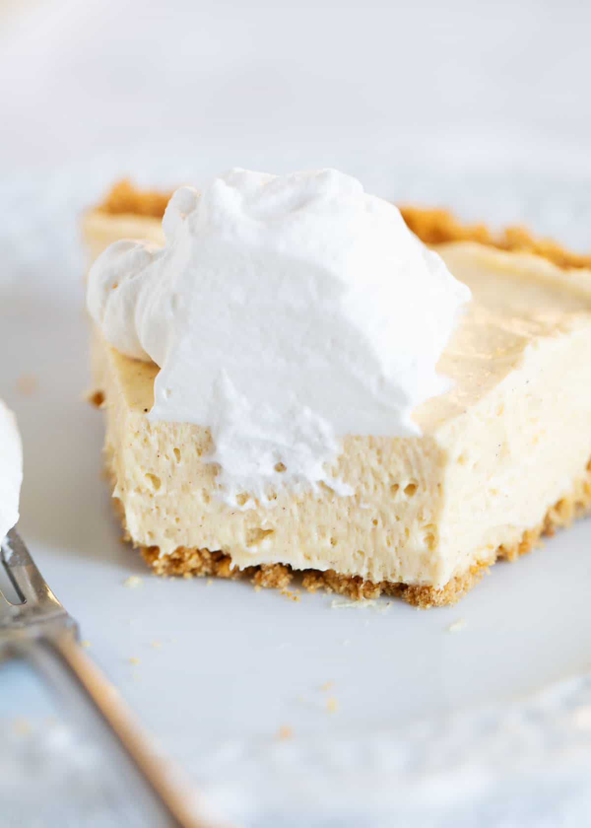 slice of eggnog pie on white plate