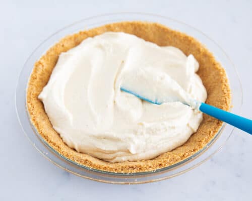 spreading eggnog pie into crust