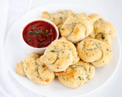 garlic knots on white plate