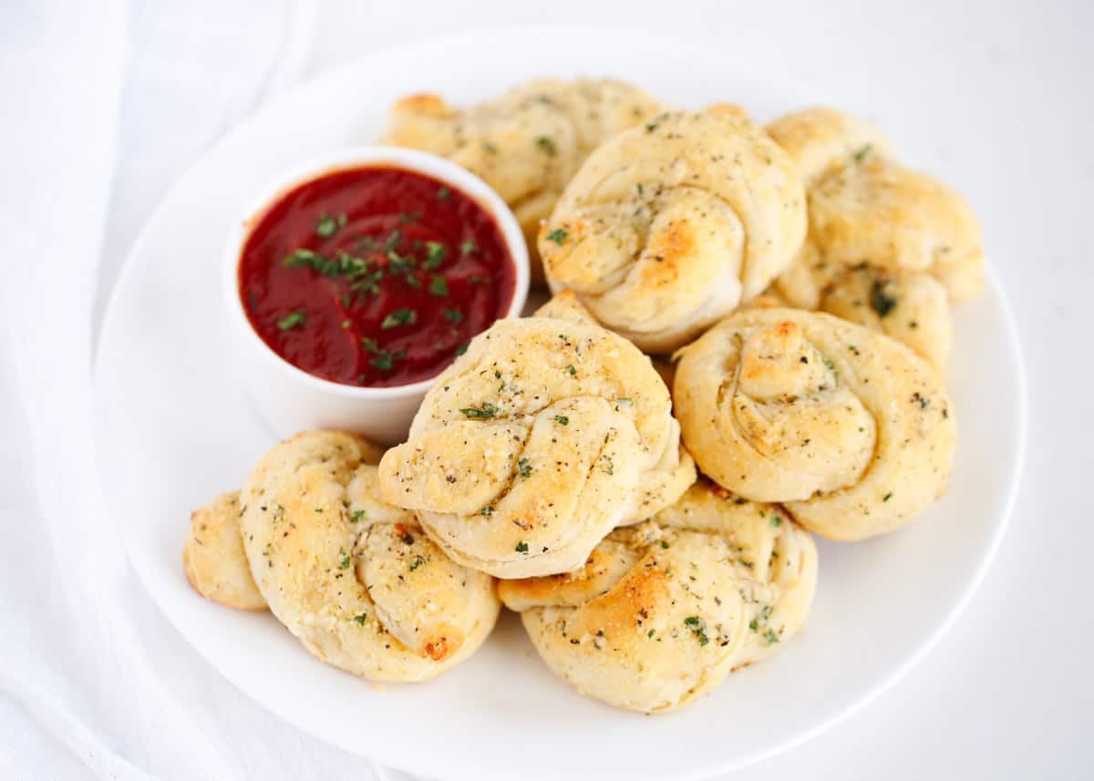 garlic knots on white plate