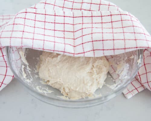 covering dough with towel