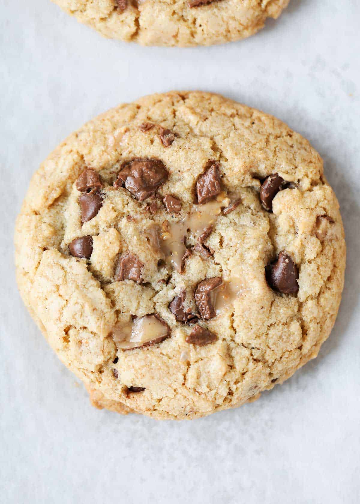 Toffee cookies on parchment paper.