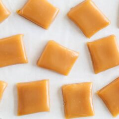Microwave caramels cut into pieces on the counter.