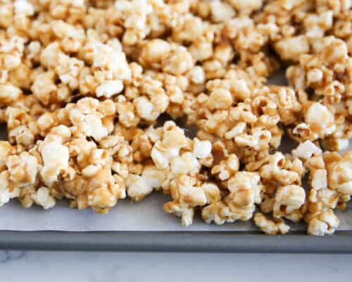 caramel corn on baking sheet